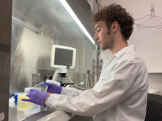 bryce wilson working in lab with medical equipment