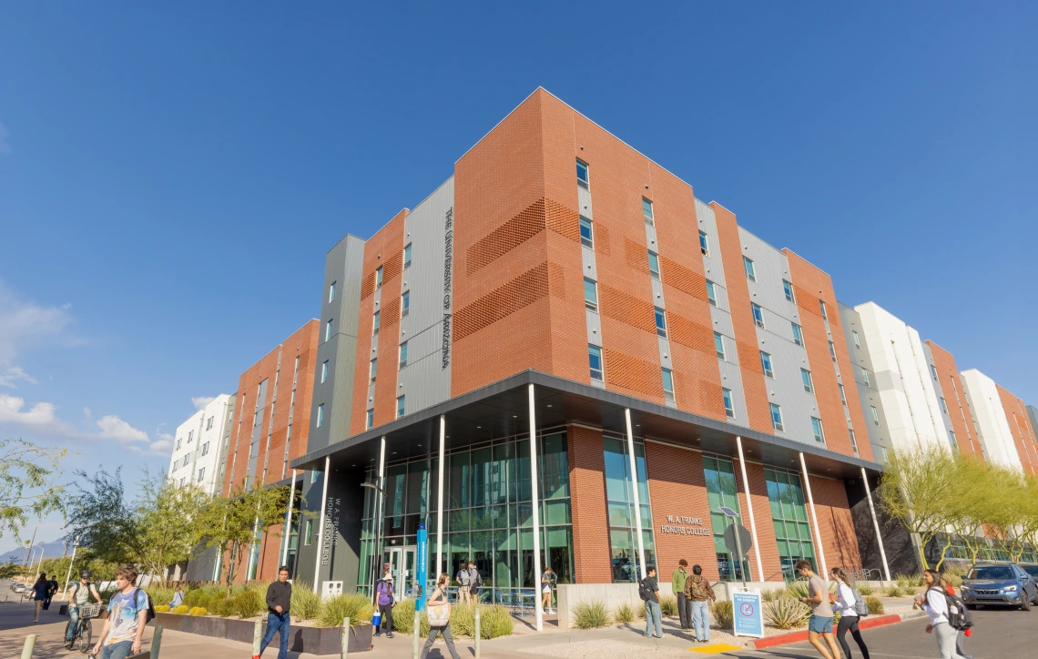 front of franke honors college with blue sky background