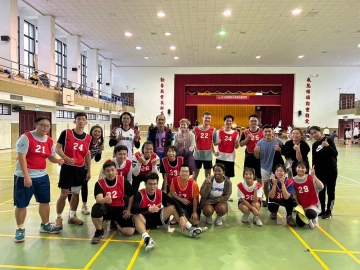 group of students playing basketball