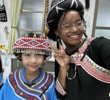 hanna and student getting ready to perform Bunun songs for the school talent show
